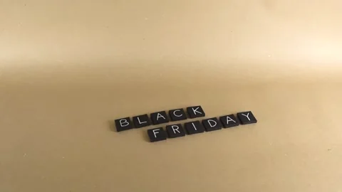 Black Friday text with tile letters on a golden background concept Stock Footage 342656306