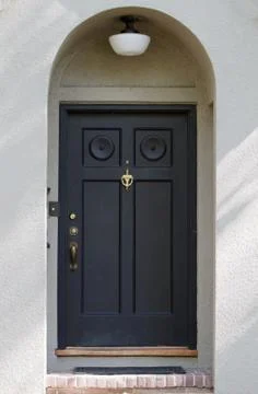 Black front door Stock Photos