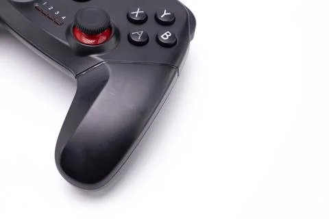 Black Game Controller Detail - Close-up of Buttons and Joystick on White Ba.. Stock Photos