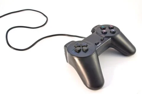 Black game controller isolated on white background Stock Photos