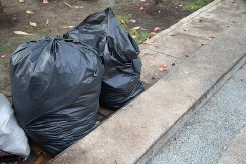 Black garbage bags. Stock Photos