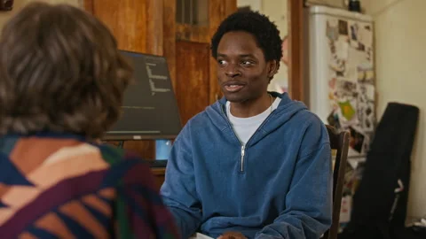 Black Gen Z Programmer Talking to Girlfriend in Shared Apartment duirng Break Stock Footage 334797986