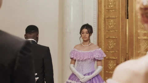 Black Gentleman Inviting Young Debutante to Dance at Ball Vídeos de archivo 256215117