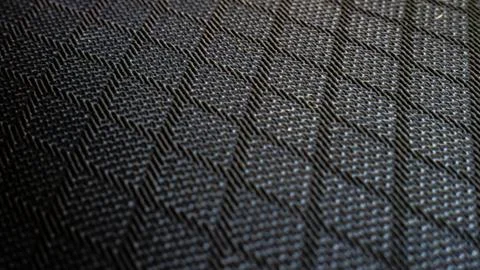 Black geometric fabric pattern with rigid grid lines Stock-Fotos