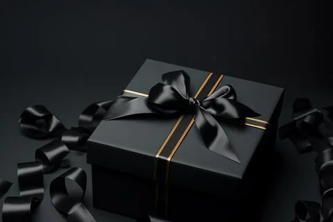 Black gift box on black background with empty space for text. Stock Photos