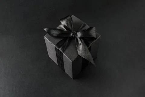 Black gift box with bow Stock Photos