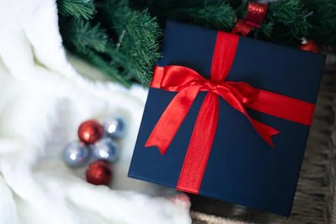 Black gift box with a red bow Stock Photos