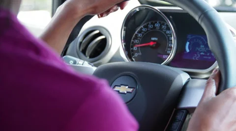 Black girl control the steering and Speedometer shows the speed Stock Footage 36242559