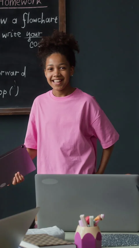 Black Girl Presenting Robotics Project in Classroom Stock Footage 339189786