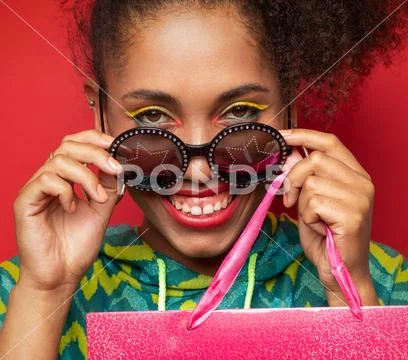 Black girl with shopping bag Stock Photos