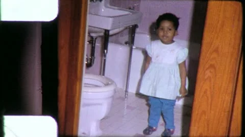 BLACK GIRL TOILET Training African American 1970s Vintage Film Home Movie 6275 Stock Footage
