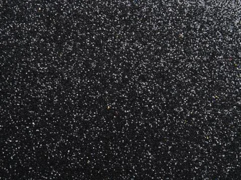 Black glittering background Stock Photos