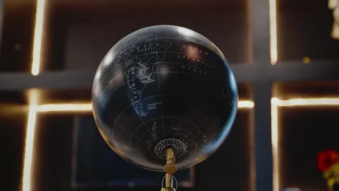 A black globe map in the living room Stock-Footage 341940547