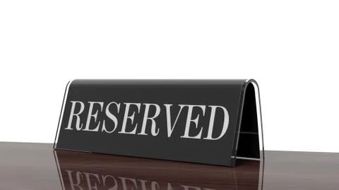 Black glossy reservation sign on wooden surface, isolated on white background Stock Photos