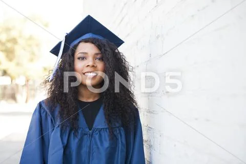 Black Graduate Wearing Cap And Gown - Stock Image - Everypixel Black Graduate Wearing Cap And Gown - Stock Image - Everypixel