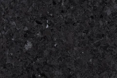 Black granite tile texture, background from natural stone. Stock Photos