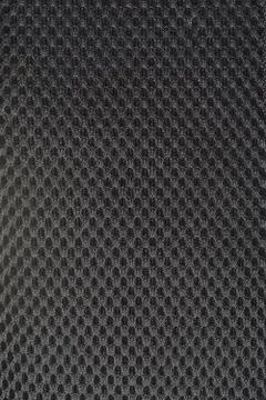 Black gray fishnet cloth material as a texture background Stock Photos