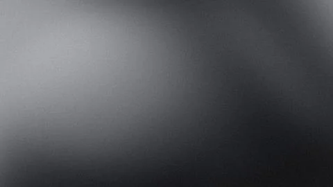 Black gray gradient grainy background 4K abstract tech wallpaper blur grung.. Stock Photos