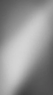 Black gray white gradient background vertical image with grainy abstract te.. Stock Photos
