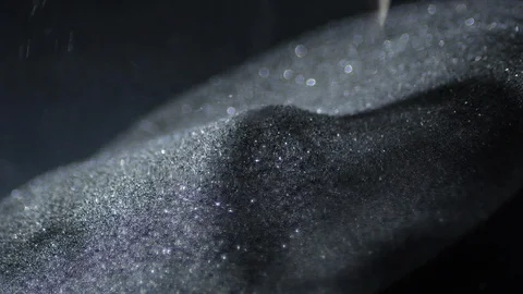 Black grey sand grains falling inside of a sand clock 스톡 동영상 120363382