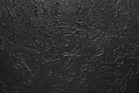 Black grunge surface as background Stock Photos