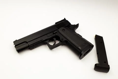 Black gun on white background Stock Photos