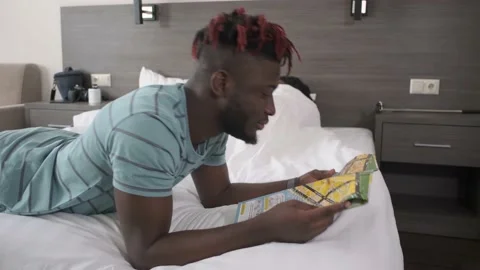 Black guy explores the map. The hotel. Video stock 151001277