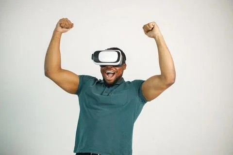 Black guy with virtual reality glasses isolated on white background Stock Photos