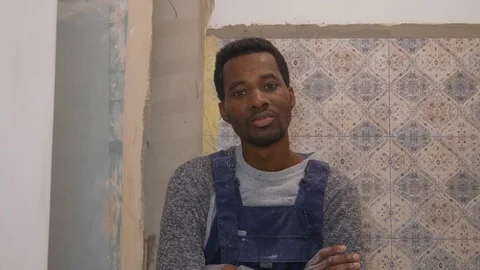 Black guy for work at a construction Stock Footage 104314062