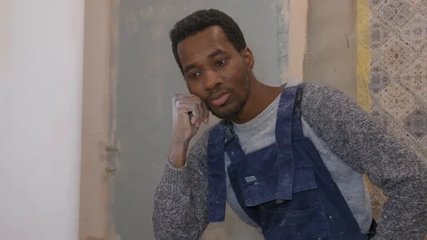 Black guy for work at a construction Stock Footage 104314175