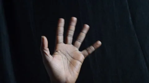 A black hand waving Stock Footage 276594362