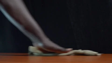 Black hand wiping down a desk table Stock Footage 276594280