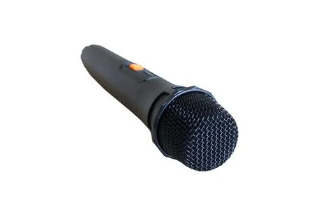 A black handheld wireless microphone angled toward the camera Stock Photos