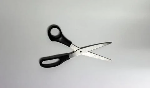 Black handle scissors on the isolated white background Foto stock