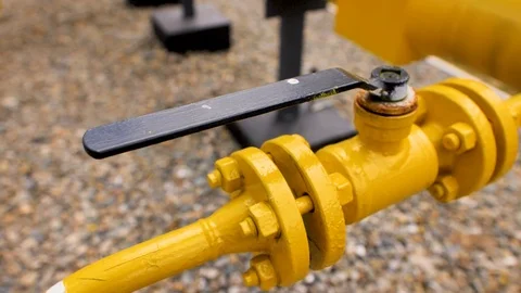 Black handle on the yellow pipe Stock Footage 127367983