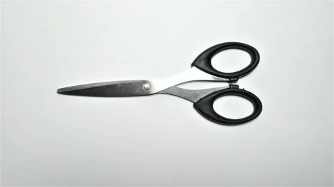 Black handled scissors isolated on white background. Stock Photos