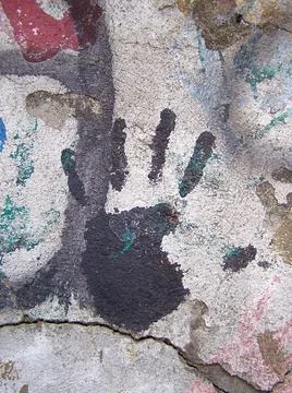 Black handprint on wall Stock Photos