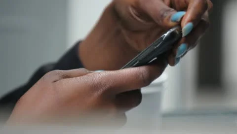 Black Hands on Cell Phone Stock Footage 11364333