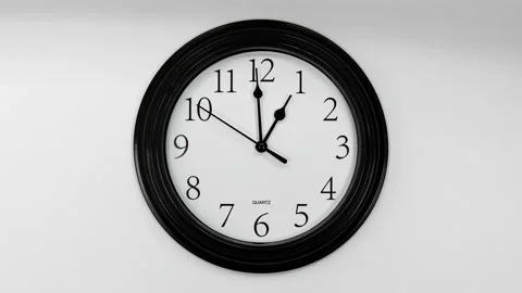 Black Hands On The Clock. Wall Clock Face Of Time Of 1.00 Am Or Pm. 4k. ProRes. Stock Footage 196006914