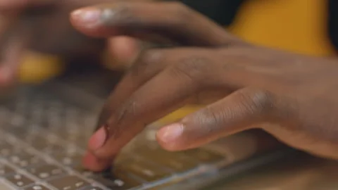 Black hands typing laptop for research, student composing notes, campus Stock Footage 335306351