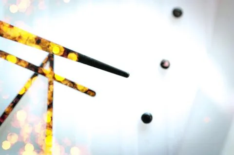 Black Hands on White Clock Face. Golden Celebration Lights Reflections. Holid Stock Photos