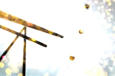 Black Hands on White Clock Face. Golden Celebration Lights Reflections. Stock Photos