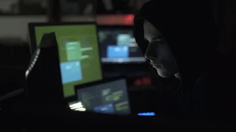 Black hat hacking a computer network and accessing data Stock Footage 92162940