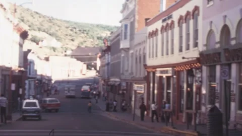 Black Hawk, Colorado - 1980: downtown traffic pedestrians crossing street Stock-Footage 252182379