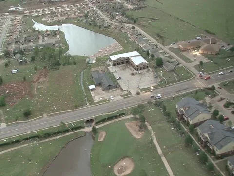 Black Hawk helicopter flies over Moore damaged area - 2013 Stock Footage 106144712