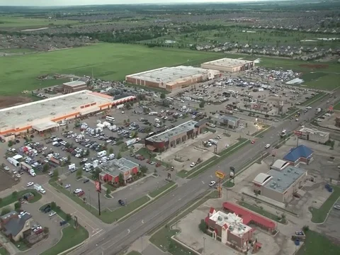 Black Hawk helicopter flies over Moore damaged area - 2013 Stock Footage 106144760