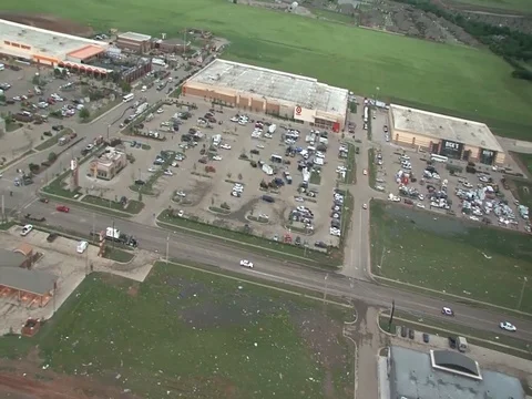 Black Hawk helicopter flies over Moore damaged area - 2013 Stock Footage 106144770