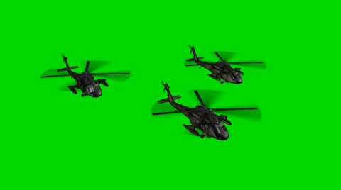 Black Hawk Helicopter fly by in Formation - seperated on green screen Vidéo 33906295