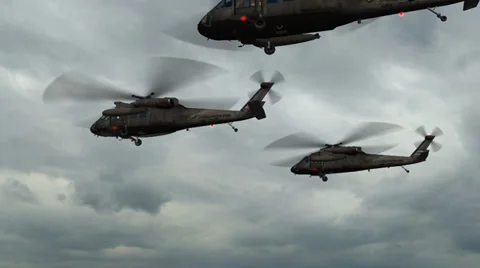 Black Hawk Helicopter fly over in stormclouds and lightning Stockbeeldmateriaal 35563003