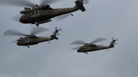 Black Hawk Helicopter fly over in stormclouds and lightning Видео 35567469
